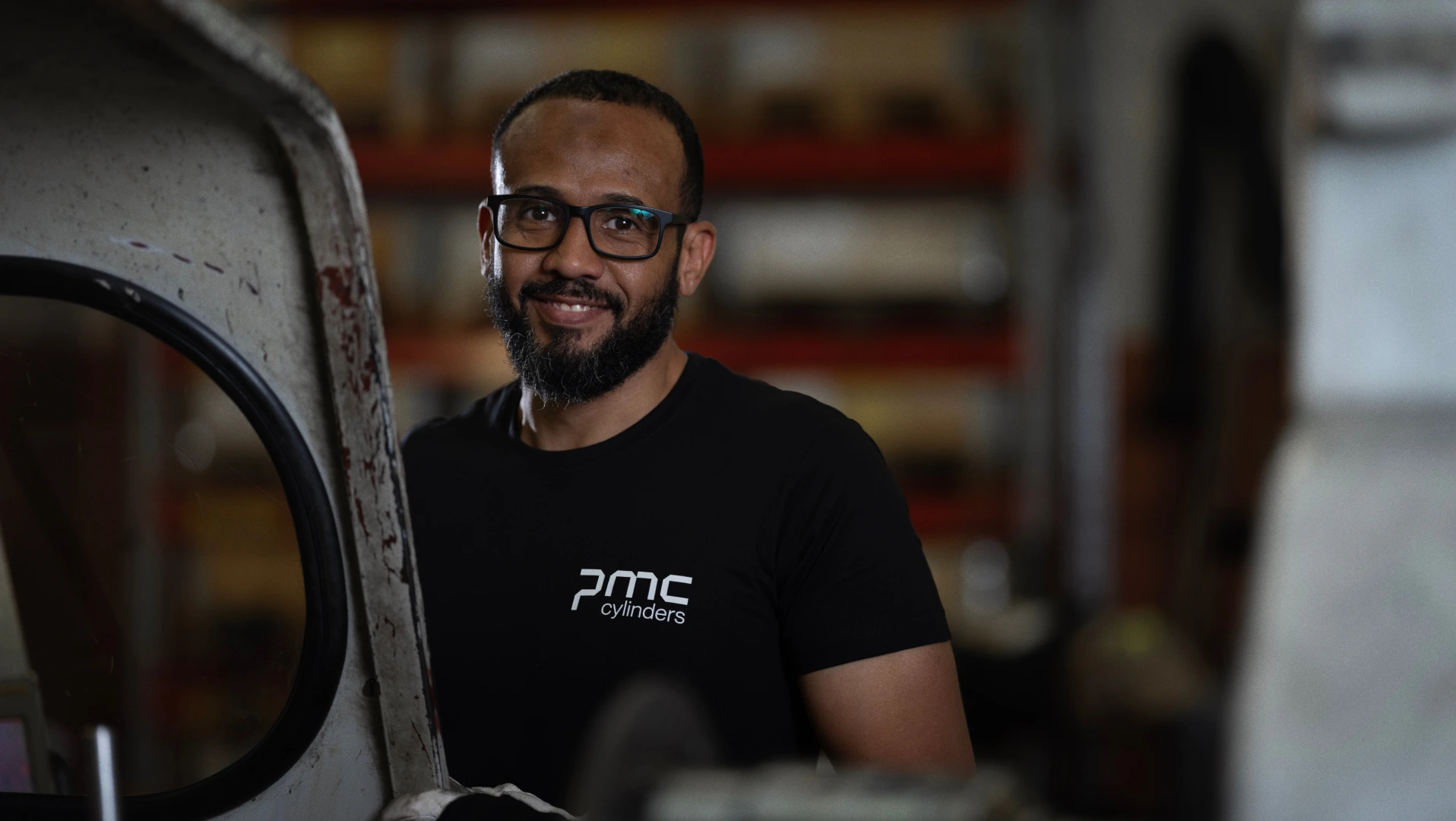 Employee wearing a PMC t-shirt