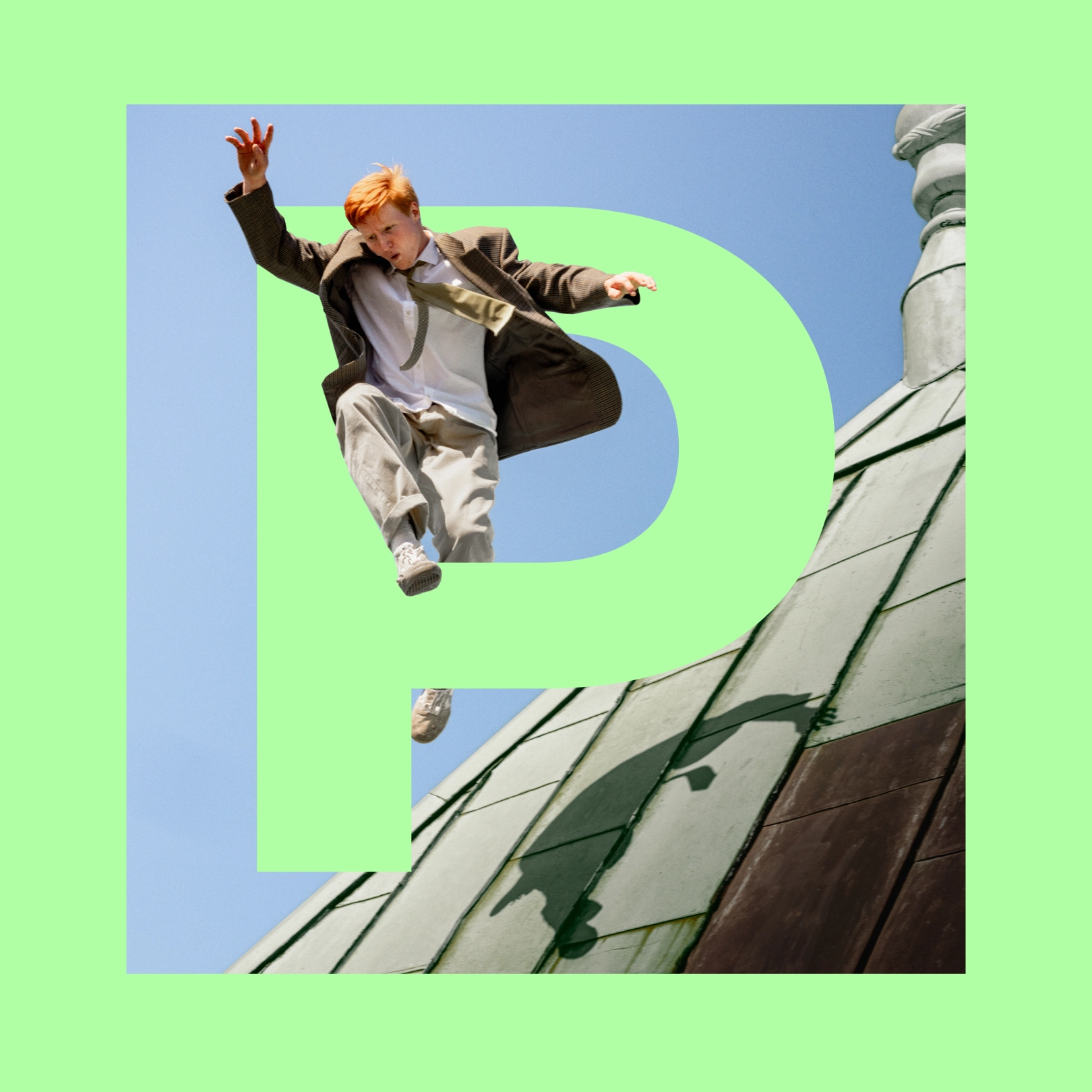 Man in a shirt jumping from a building with a green P displayed that he is jumping through - Ny Studio