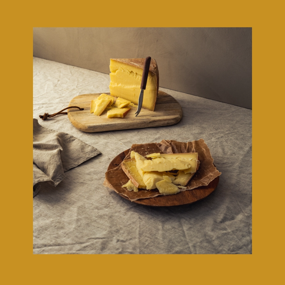 Table with cheese on plates - Ny Studio