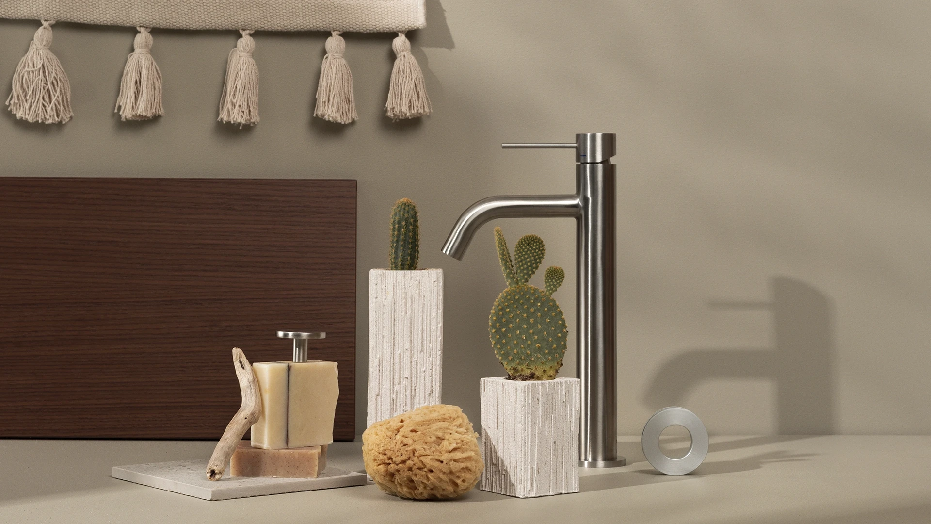Faucet styled with small cacti's in white pots and soaps - NyStudio