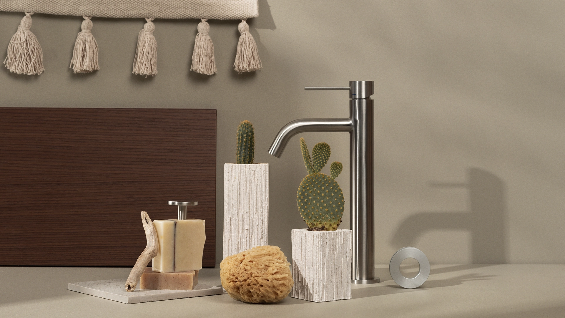 Faucet styled with small cacti's in white pots and soaps - NyStudio