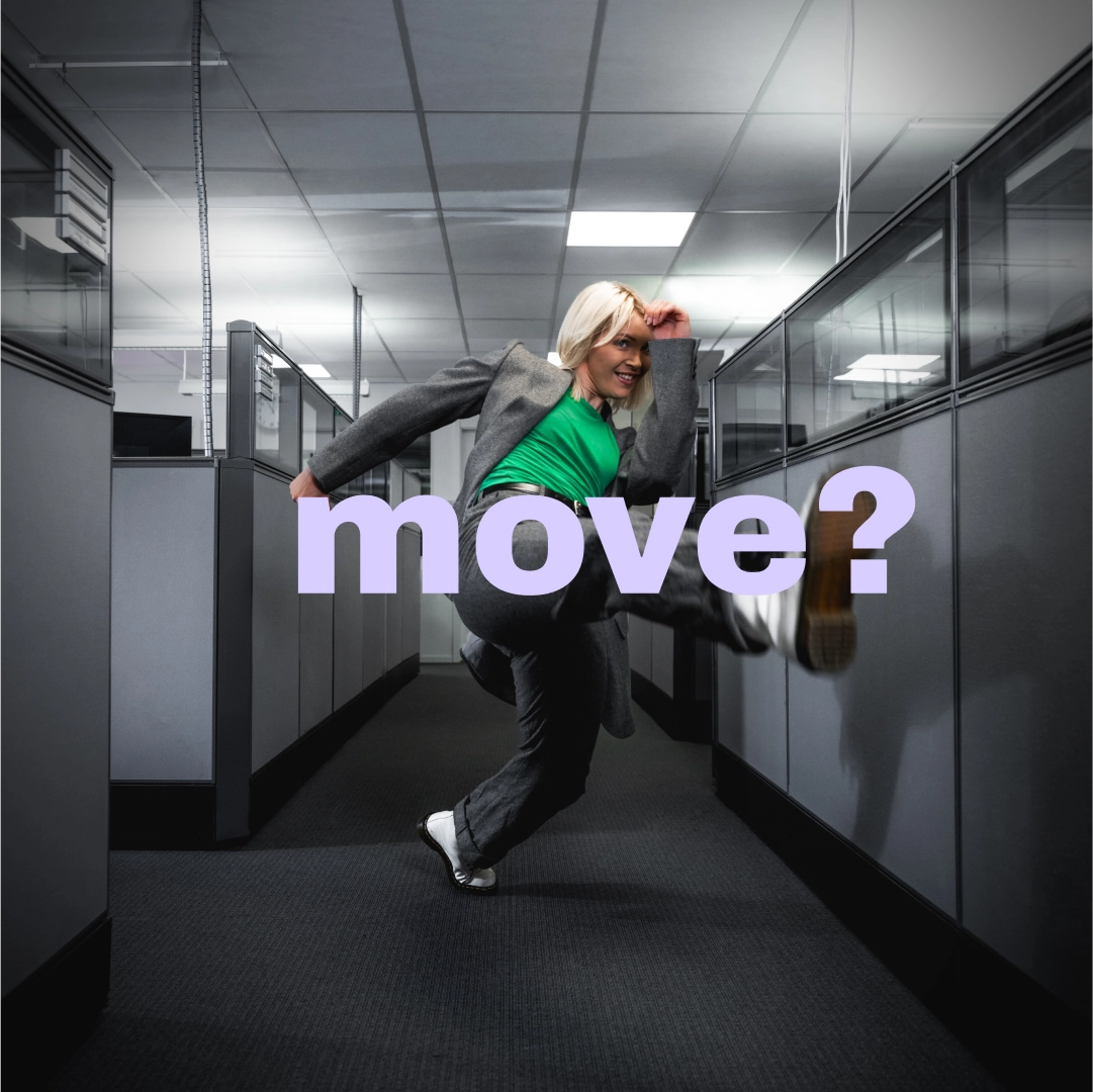 Woman in an office kicking in the air and the text "move?" is displayed - Ny Studio